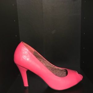 Hot pink peep toe pumps